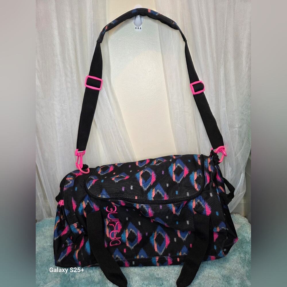 Dakine Black and Pink Patterned Travel Bag